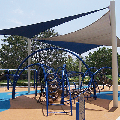 Shade structures like canopies, in public environments, providing shade and UV protection.